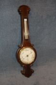 A mahogany banjo barometer by Robson and Co, 43 Dean Street, Newcastle upon Tyne.92 cm high