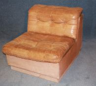 A 1970`s tan brown leather corner suite (5 piece).