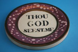 A 19th century Sunderland pink lustre circular wall plaque "Thou God See`st Me".20.5 cm diameter