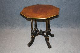 A Gillows and Co. walnut and ebonised occasional table with octagonal burr walnut top below an