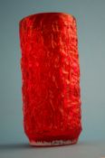 A Whitefriars red glass cylindrical textured vase. 26 cm high