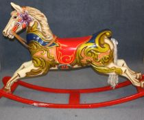 A fibreglass fairground rocking horse. 190 cm long 120 cm high