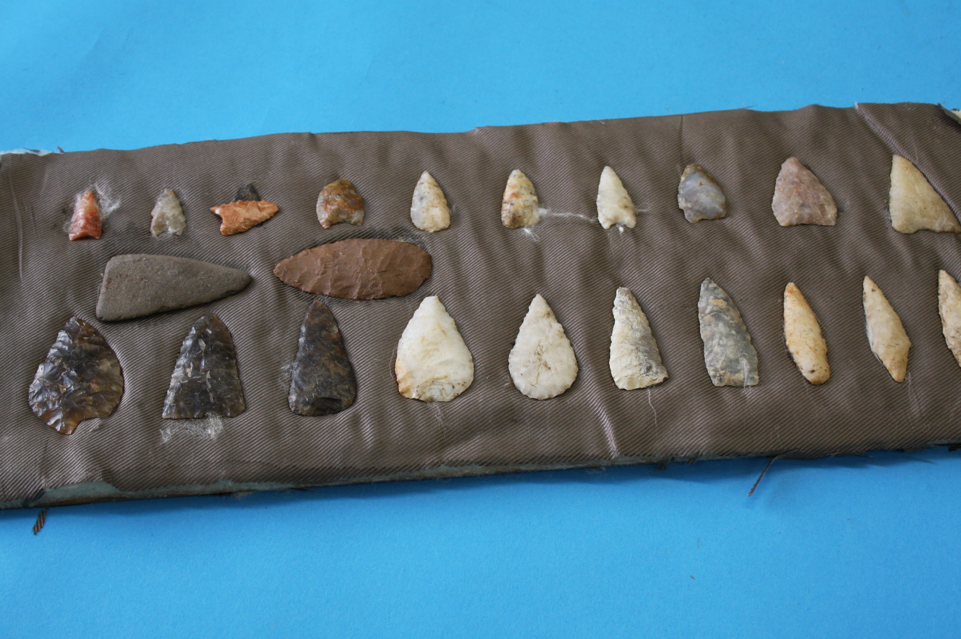A collection of ancient Patagonian flint artefacts to include knife heads and various implements.