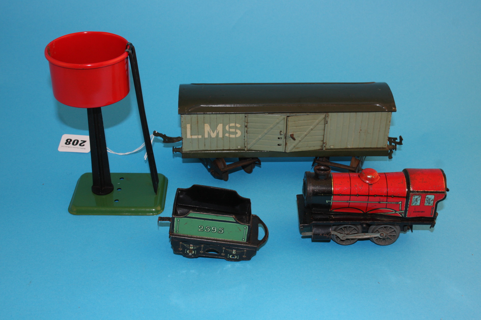 A quantity of Hornby "O" gauge transformers, points, track and some boxed rolling stock.