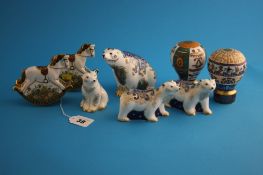 Four Royal Crown Derby  "Polar Bear" paperweights; two "Rocking horses"; and two Royal Worcester