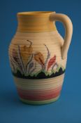 A large Clarice Cliff Wilkinson Limited "Bizarre""Gloria" pattern jug, printed mark.29 cm high