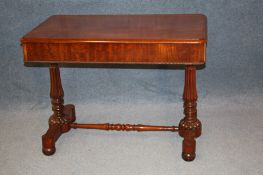 A 19th century mahogany library table, having moulded edge and two blind drawers to each end,