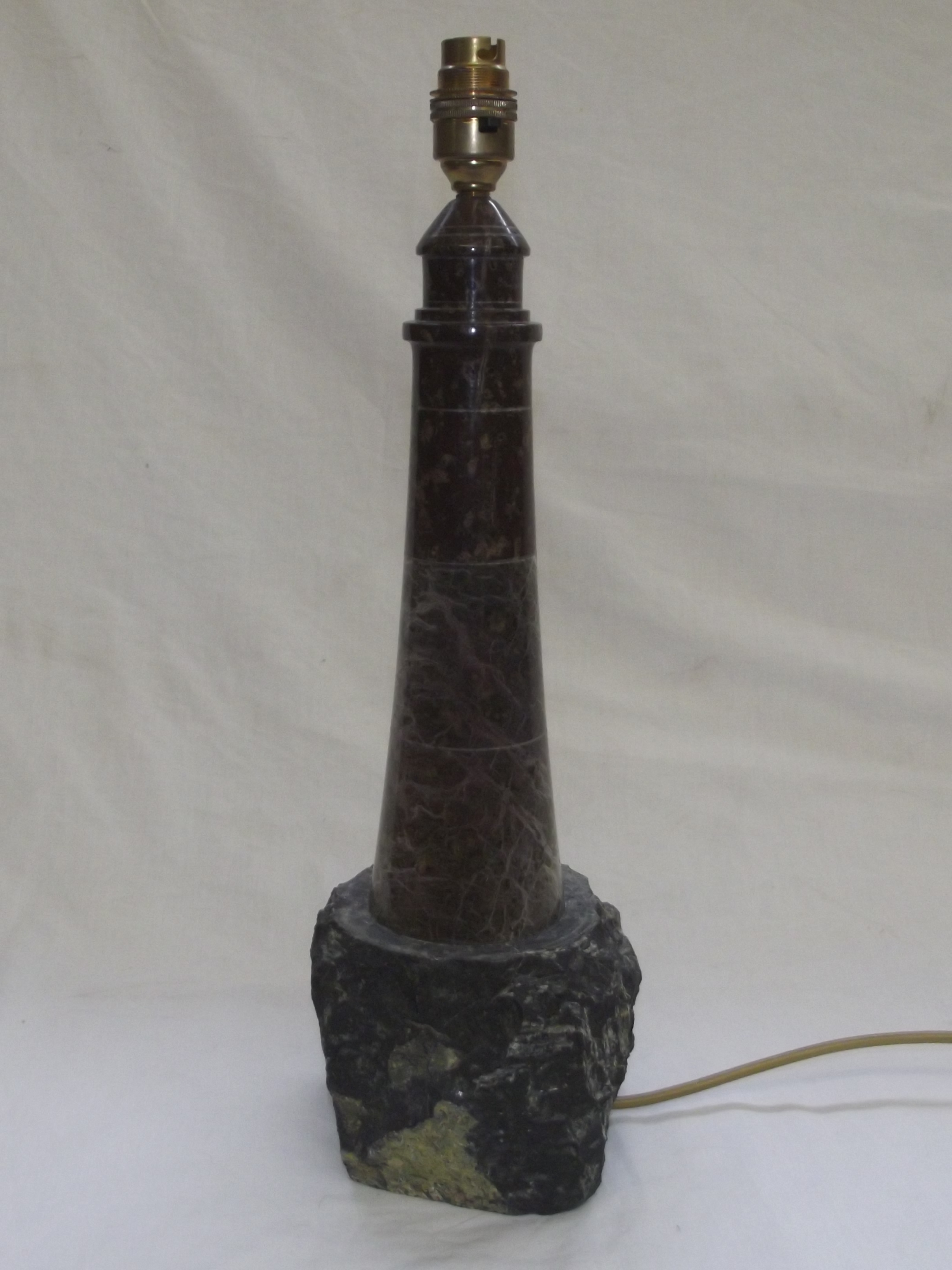 Cornish serpentine stone table lamp in the form of a lighthouse, 44cm in height