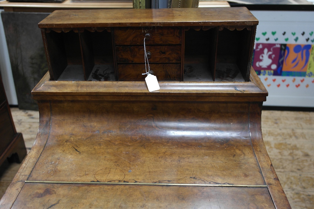 A Davenport:
19th century, walnut, the top with a lifting drawer and pigeon hole arrangement, the - Image 3 of 4