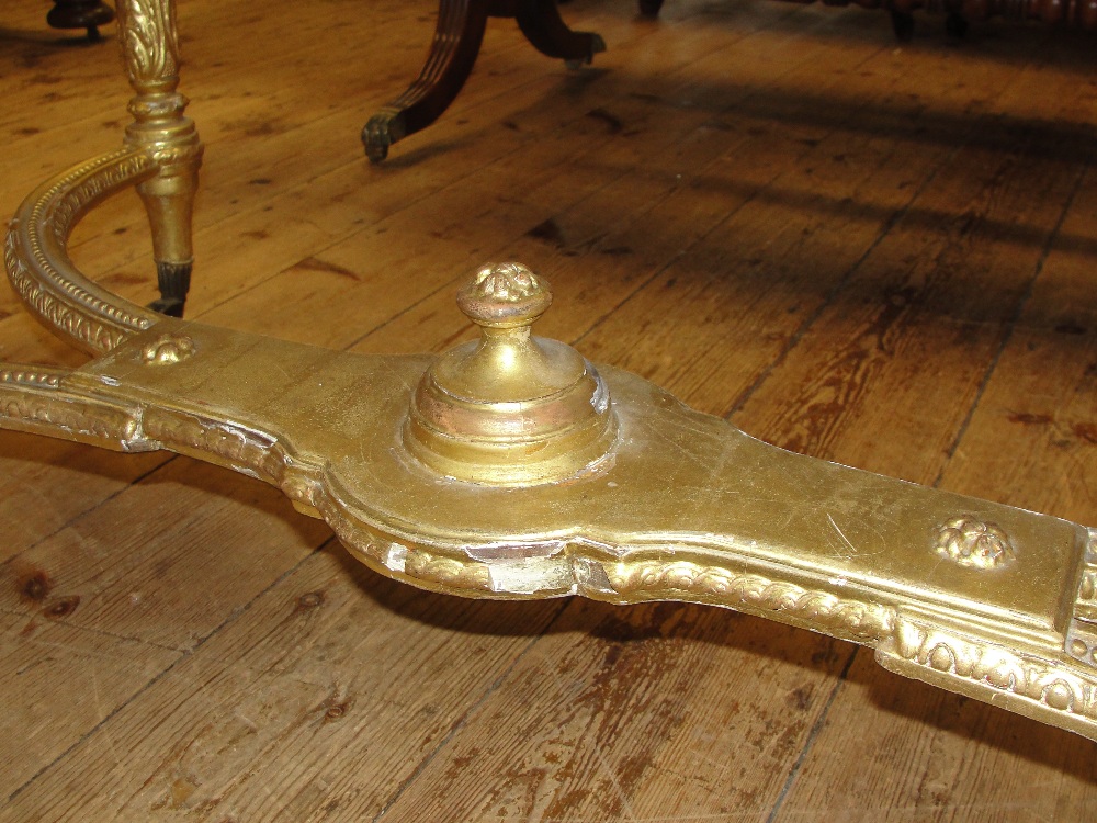A 19th Century Shaped Rectangular Giltwood Desk in Louis XVI style:
the tooled red leather top - Image 3 of 10