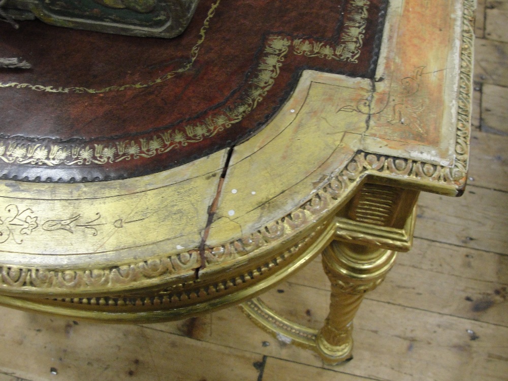A 19th Century Shaped Rectangular Giltwood Desk in Louis XVI style:
the tooled red leather top - Image 6 of 10