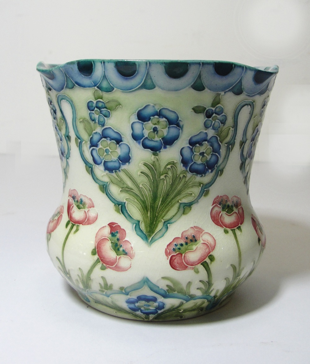 A Moorcroft Macintyre Vase:
a Moorcroft Macintyre vase of squat baluster form.   Decorated with
