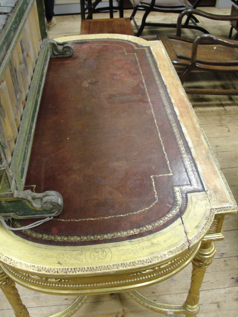 A 19th Century Shaped Rectangular Giltwood Desk in Louis XVI style:
the tooled red leather top - Image 8 of 10
