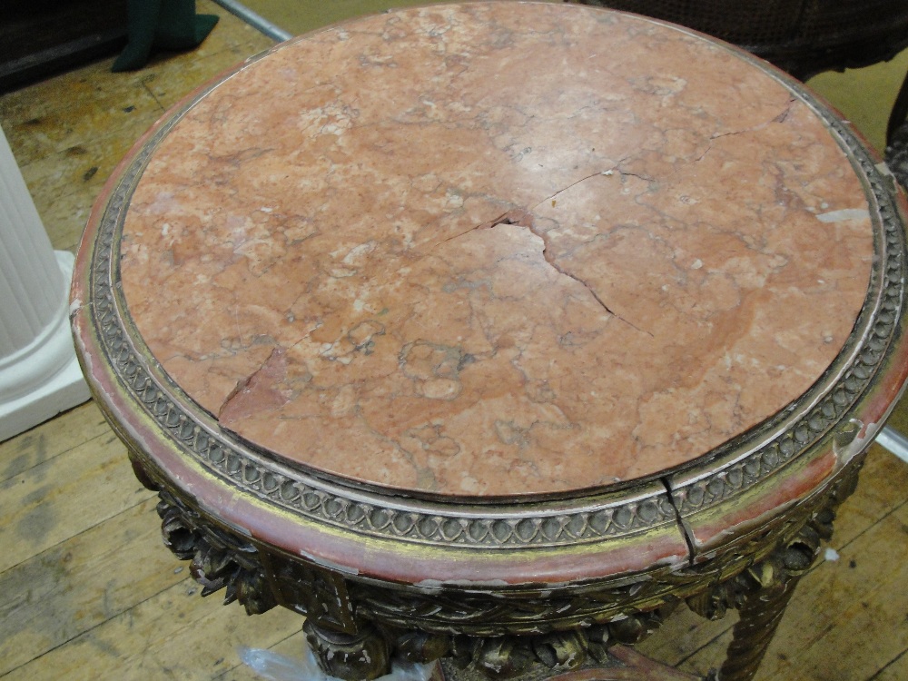 A Late 19th Century Giltwood and Marble Topped Circular Table:
the laurel swags suspended from a - Image 2 of 4