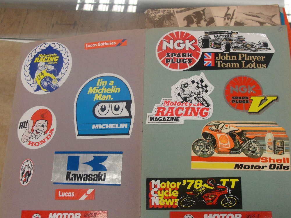 Four scrapbooks of motorbike stickers etc