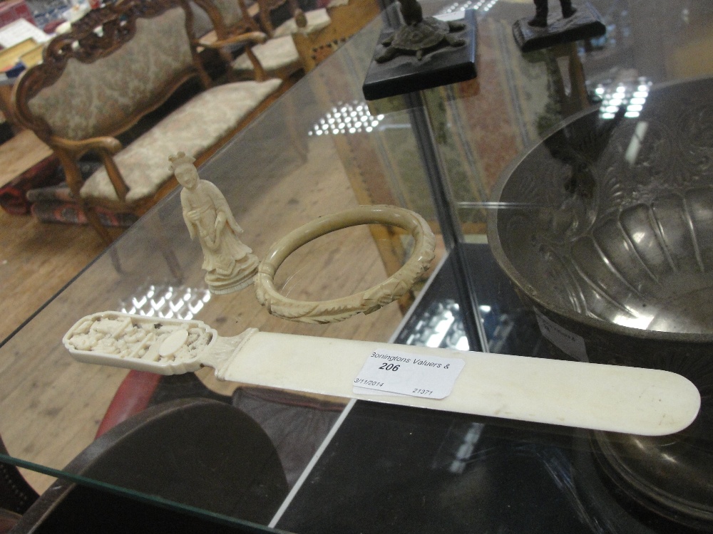 A quantity of 19th and early 20th century ivory to include a Canton Chinese page turner, bangle &