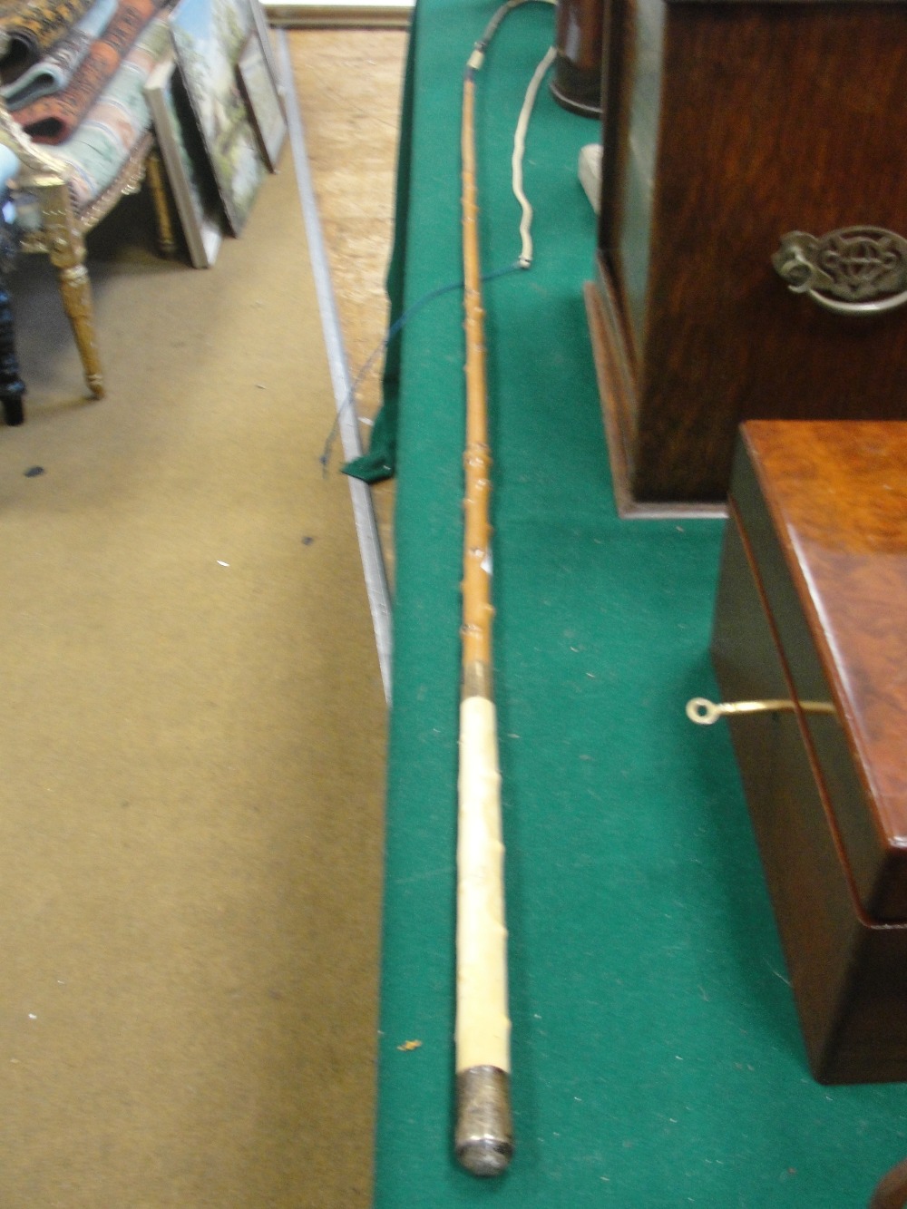 An ivory & HM silver handled whip