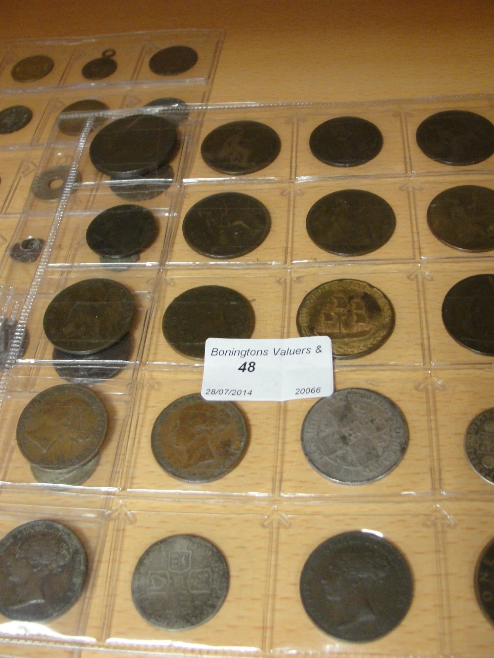 Two 18th century shillings (1707 and 1741); together with 18th century tokens and Victorian