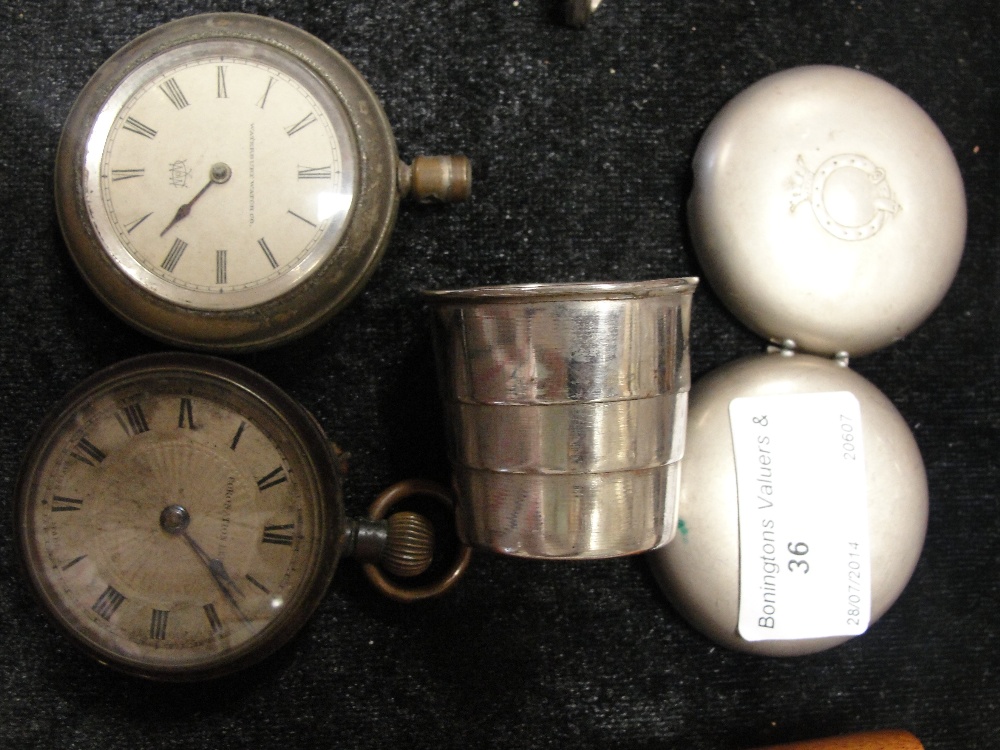 Two vintage pocket watches and a watch case with collapsible cup