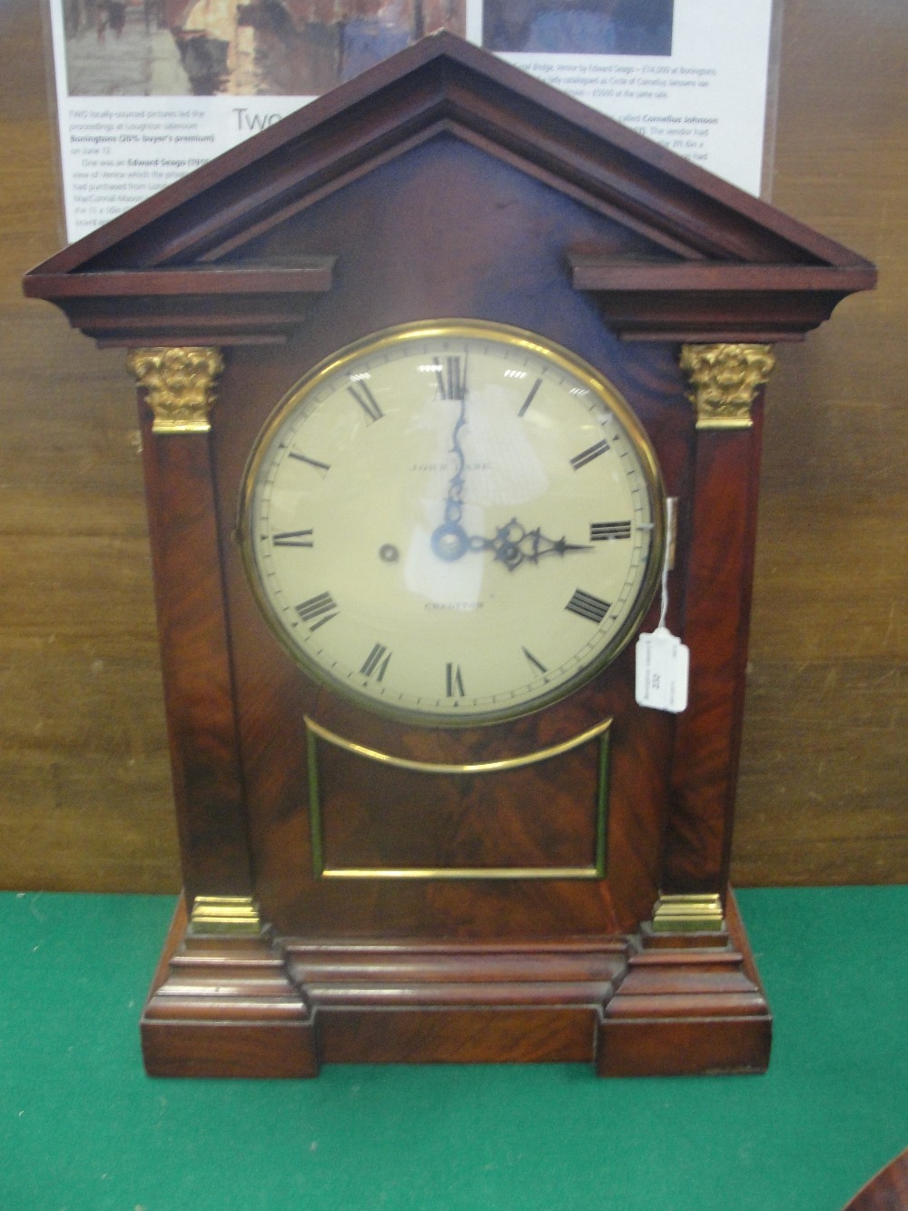 A 19th Century Library Clock by John Lane of Crediton:
large mahogany case with architectural