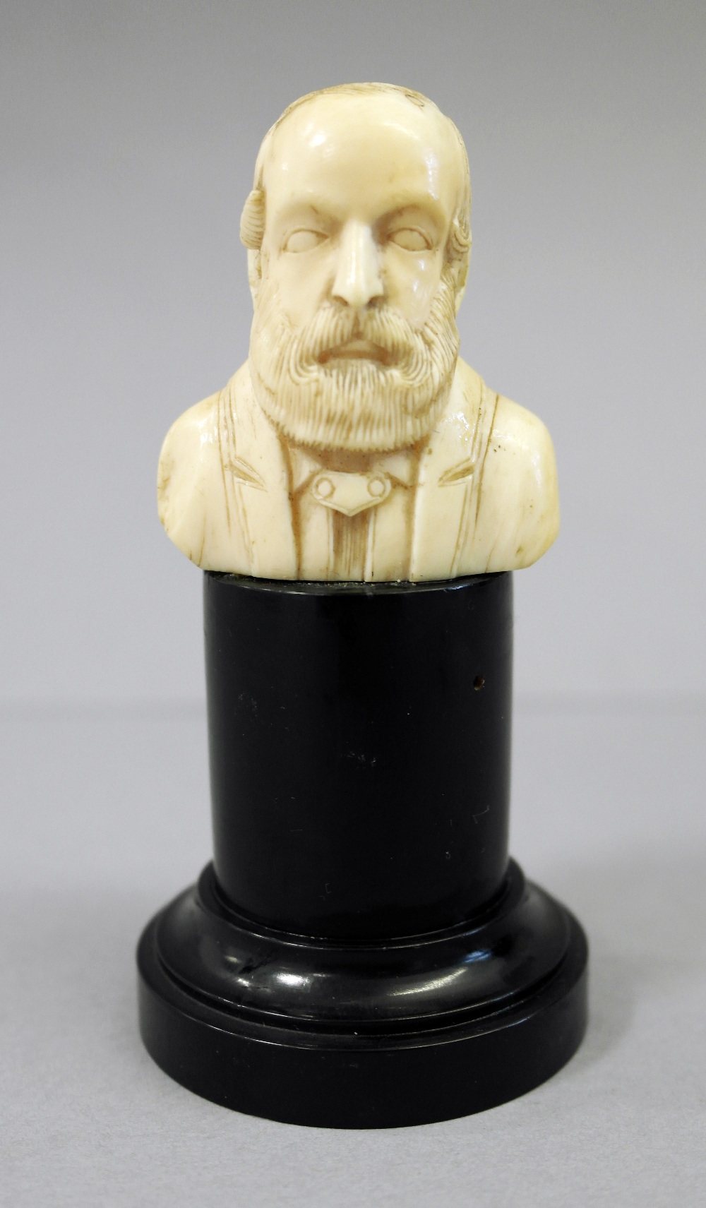 A European ivory carving
19th century
Representing the bust of a bearded man. On a tall