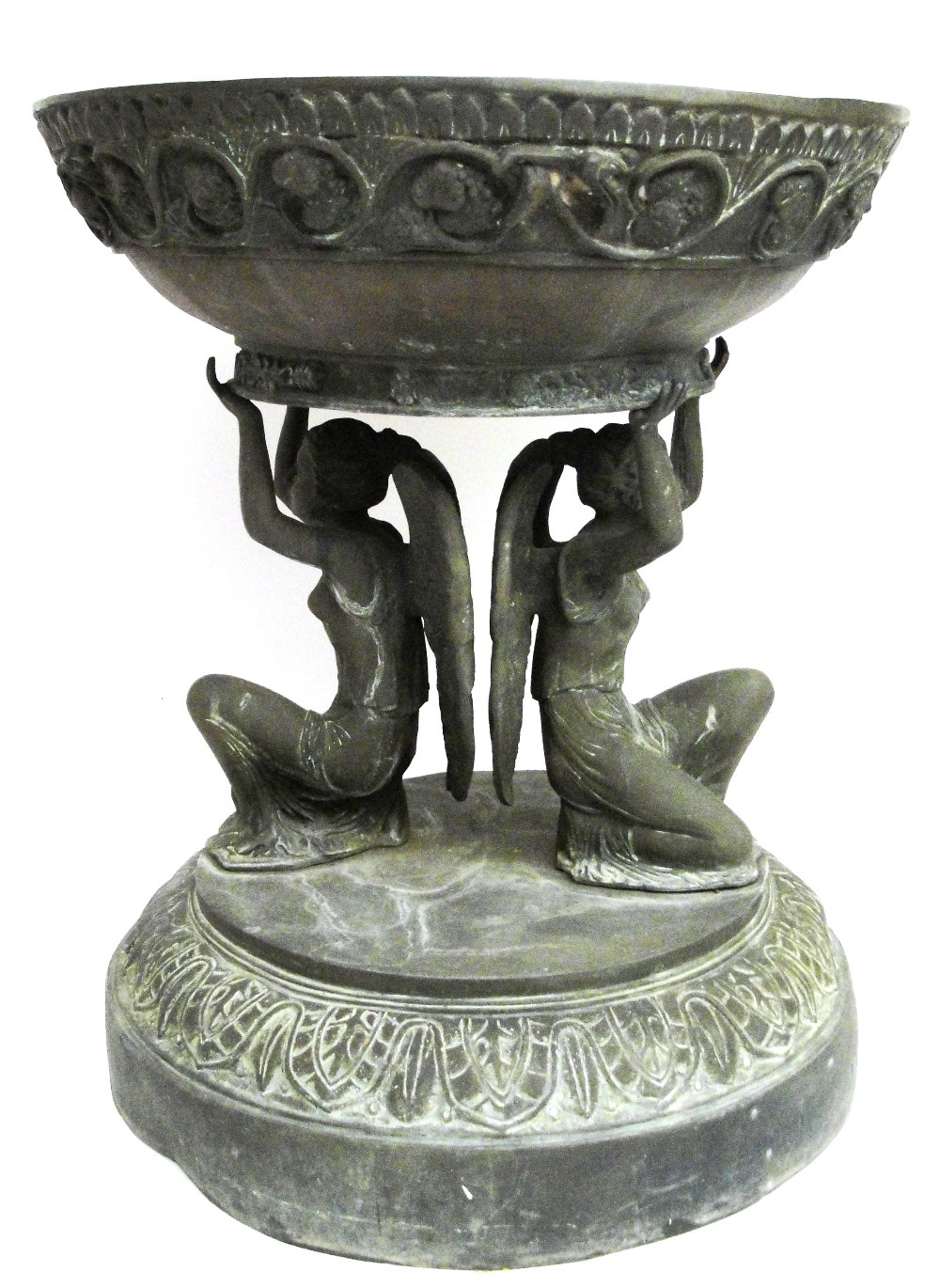 A Jardiniere:
19th century, bronze, the circular top with entwined berry & leaf decoration supported