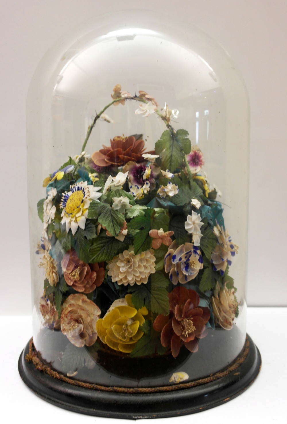 A Large 19th Century Diorama:
of large proportions featuring many different flowers in a basket