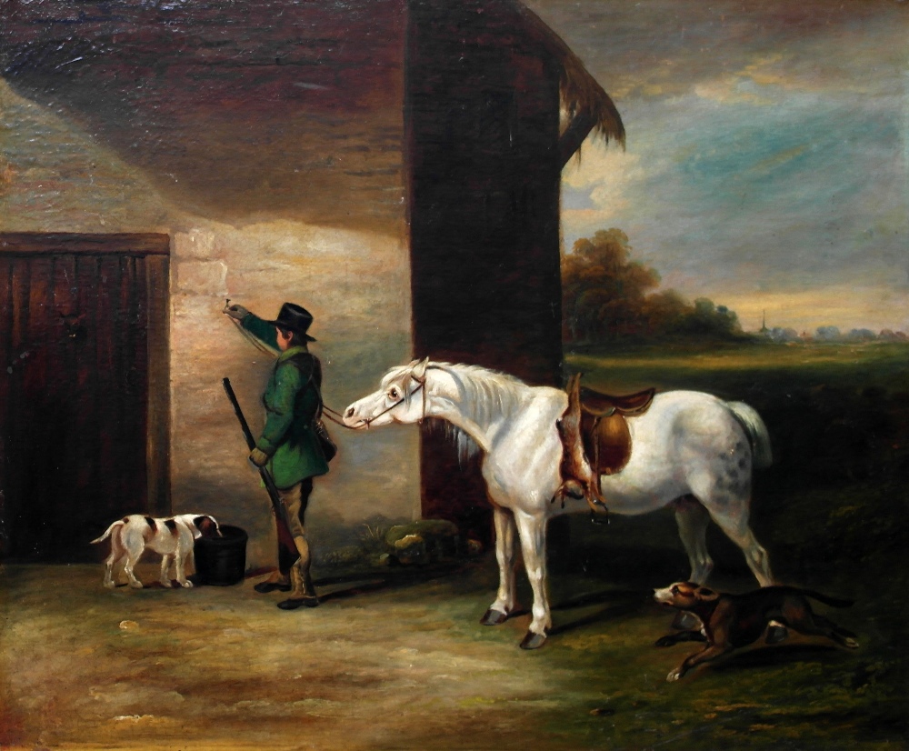 Follower of George Morland (British, 1763-1804):
A huntsman with his horse & dogs, oil on canvas,