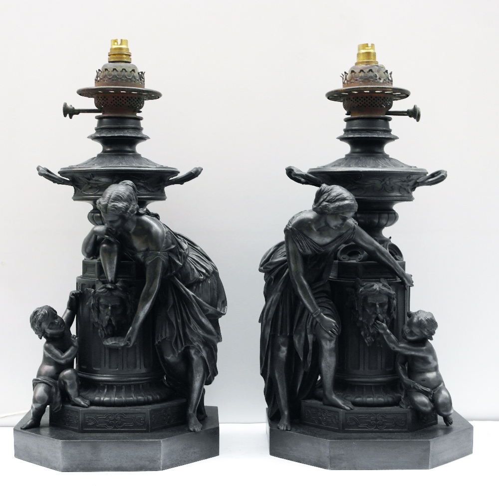 A Large Pair of 19th Century Spelter Table Lamps:
converted from oil lamps.  Standing on hexagonal