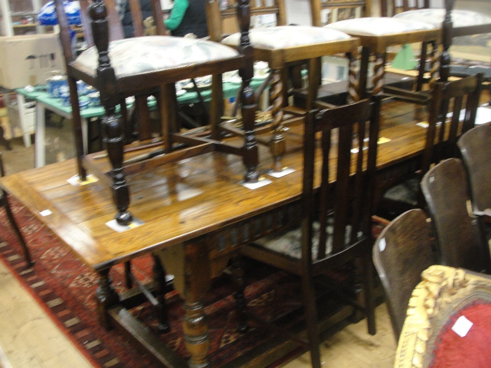 A Jacobean-style oak refectory table; together with a number of 20th century chairs
