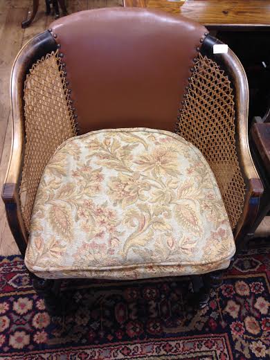 A 19th century mahogany cane sided tub chair