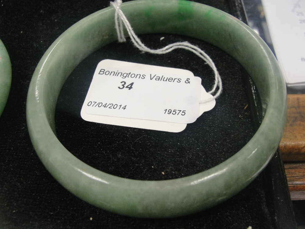 A light green jade bangle