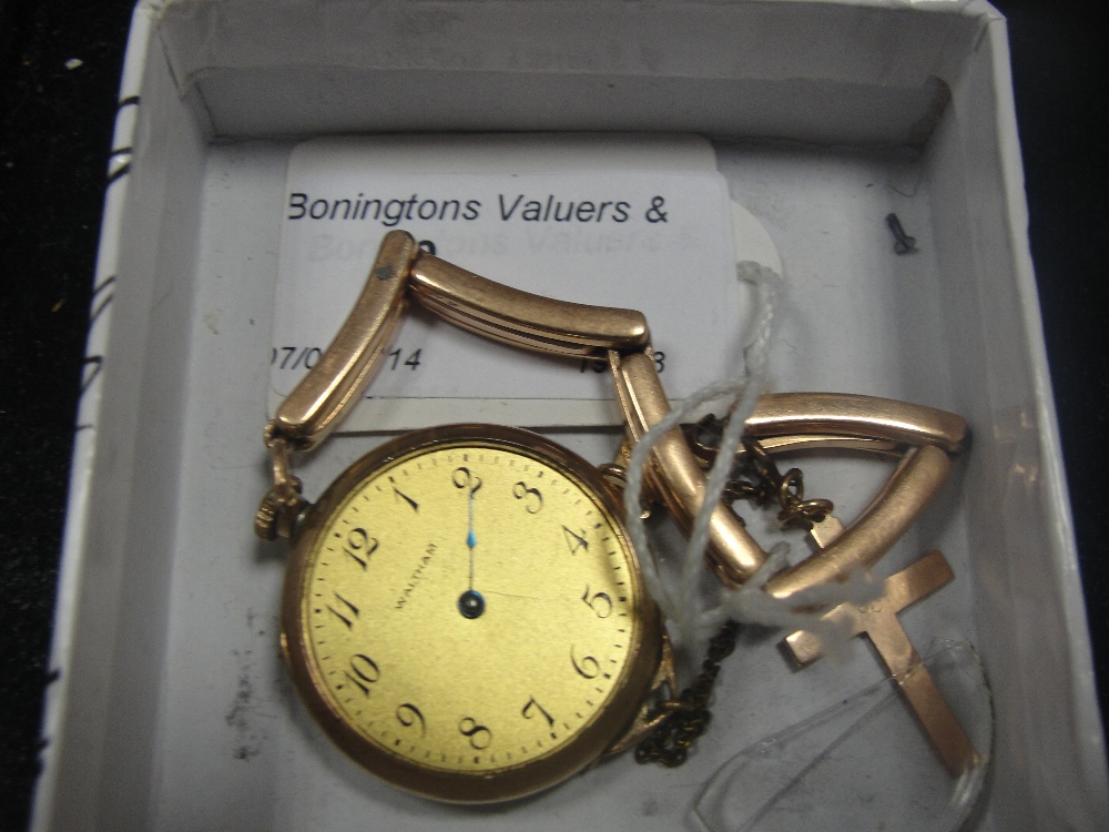 A Waltham ladies watch; together with a 9k crucifix with the initial 'P'