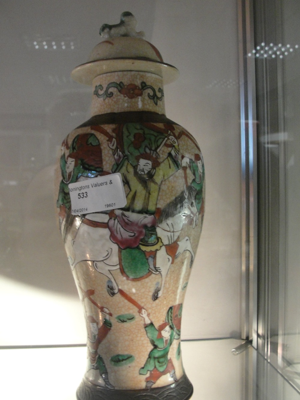A Chinese crackle glazed famille verte lidded vase