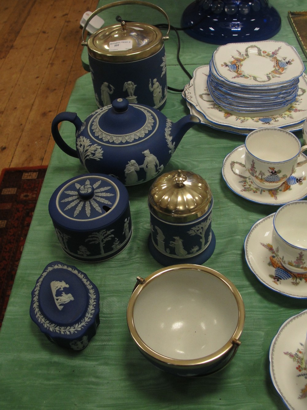 A quantity of Wedgwood Jasperware to inc biscuit barrel, teapot, sugar bowl etc