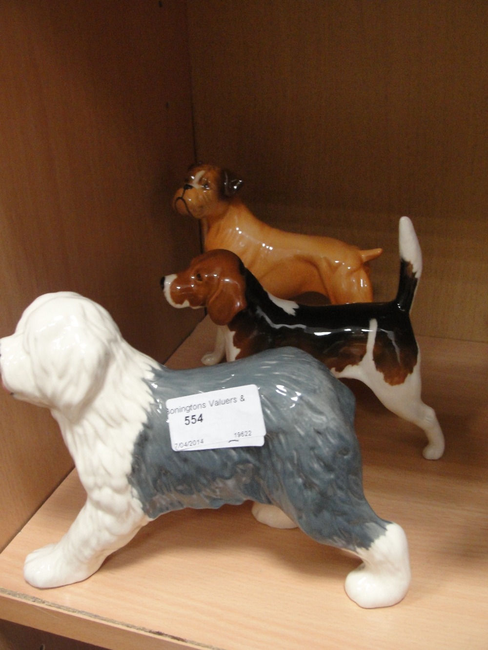 A Beswick boxer dog together with a Beswick "Wendover Billy" and a Beswick Old English sheepdog