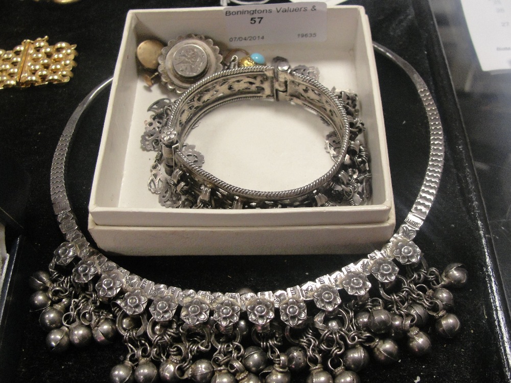 A quantity of dress jewellery to include torque necklace, bracelet and victorian turquoise earrings