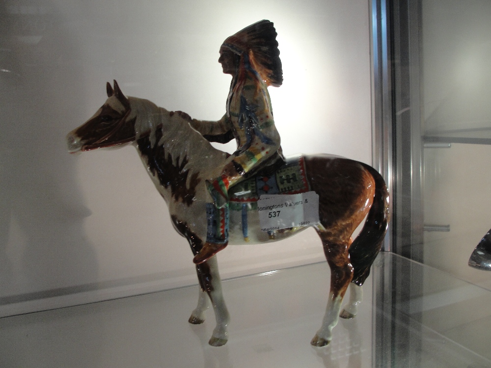 A Beswick red indian on horseback