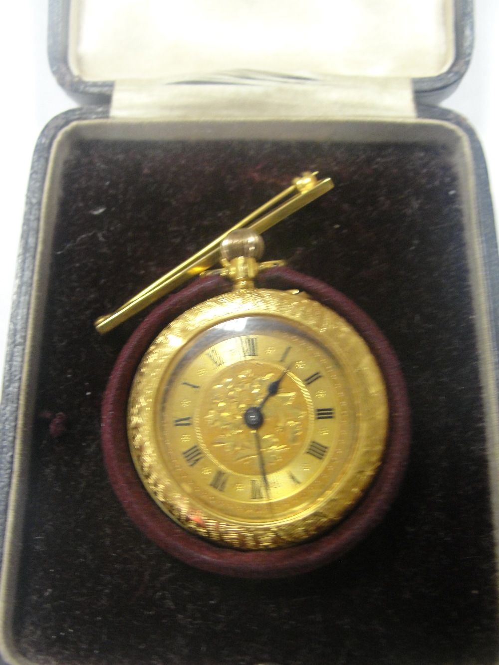 A gold pocket watch