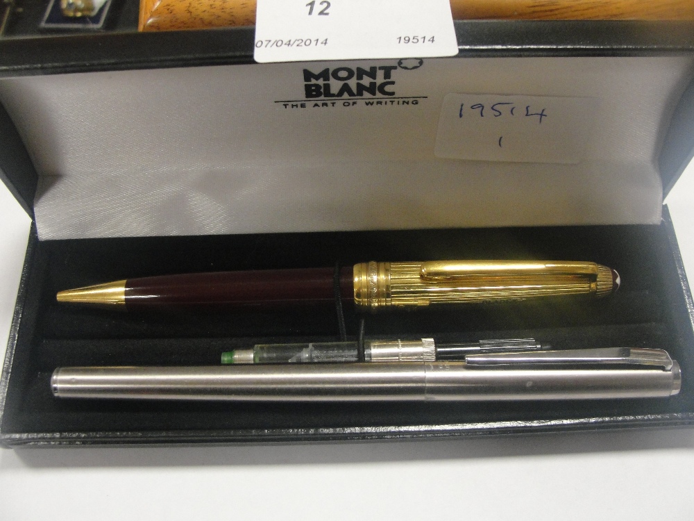 A cased gilt silver Mont Blanc solitaire biro together with a Noblisse fountain pen.