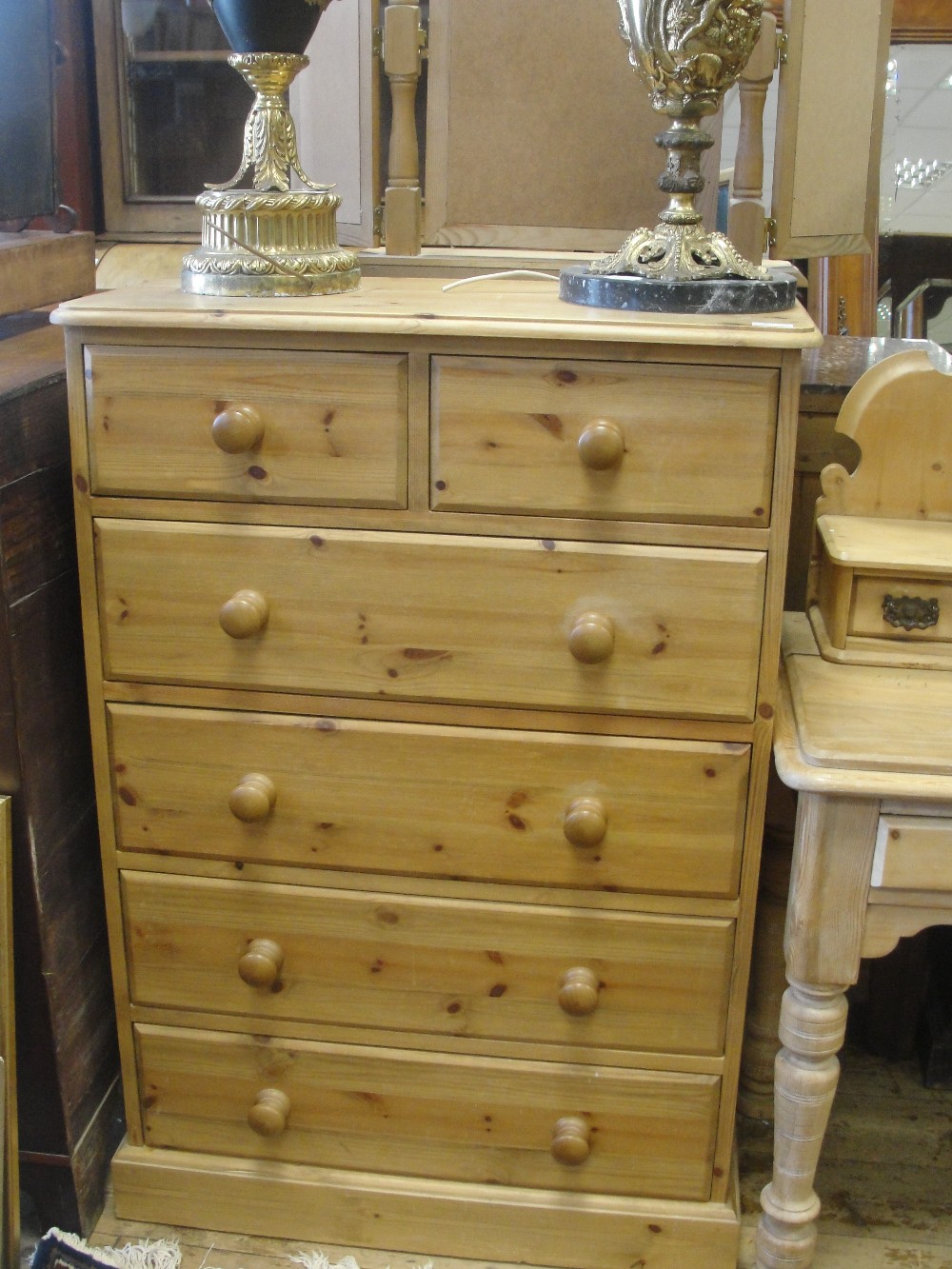 A pine two over four chest of drawers