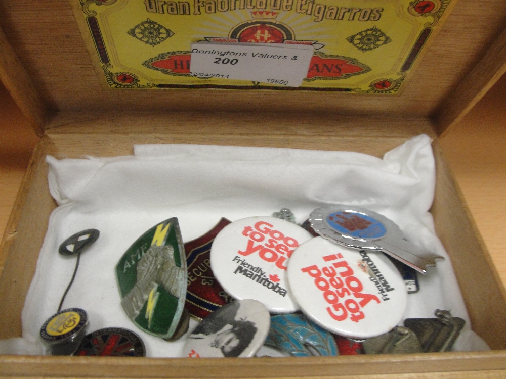 A box of vintage badges to inc music, military and football