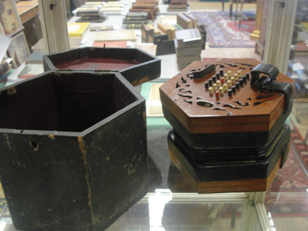 A cased Lachenal 48 key concertina