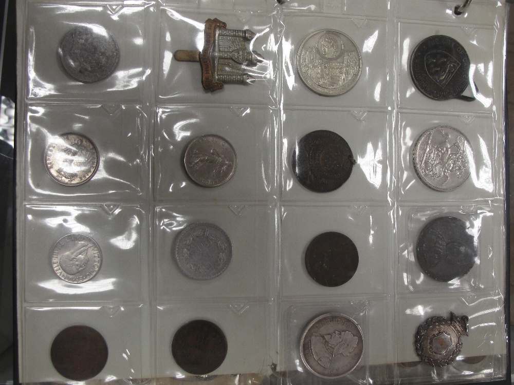 A folder of coins to inc World and GB, medallions etc