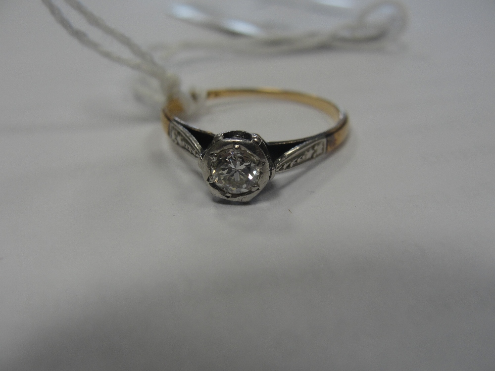An 18ct .20 diamond solitaire