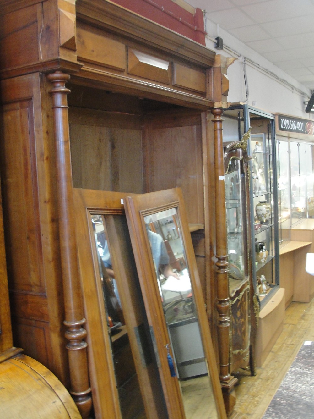 A 19th century French satinwood armoire