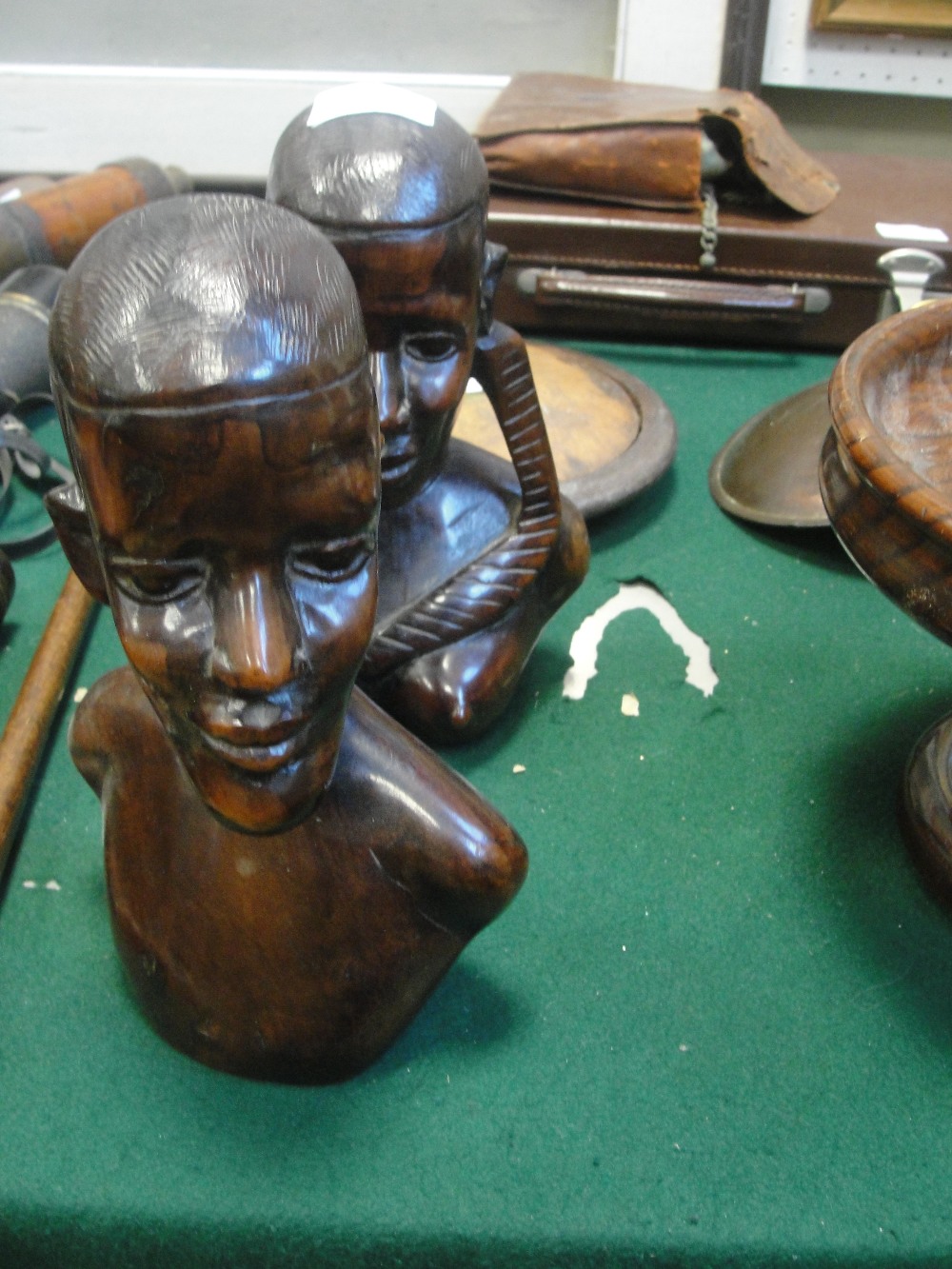 Two early 20th century African carved busts