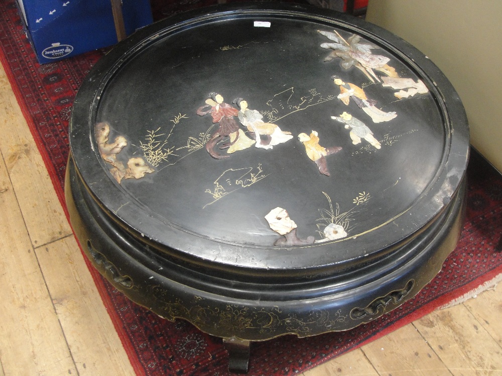 An Oriental lacquered and hardstone inlaid coffee table