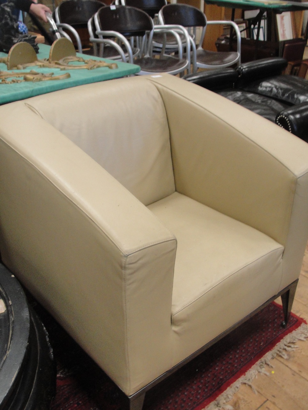 A 20th century Italian designer leather armchair