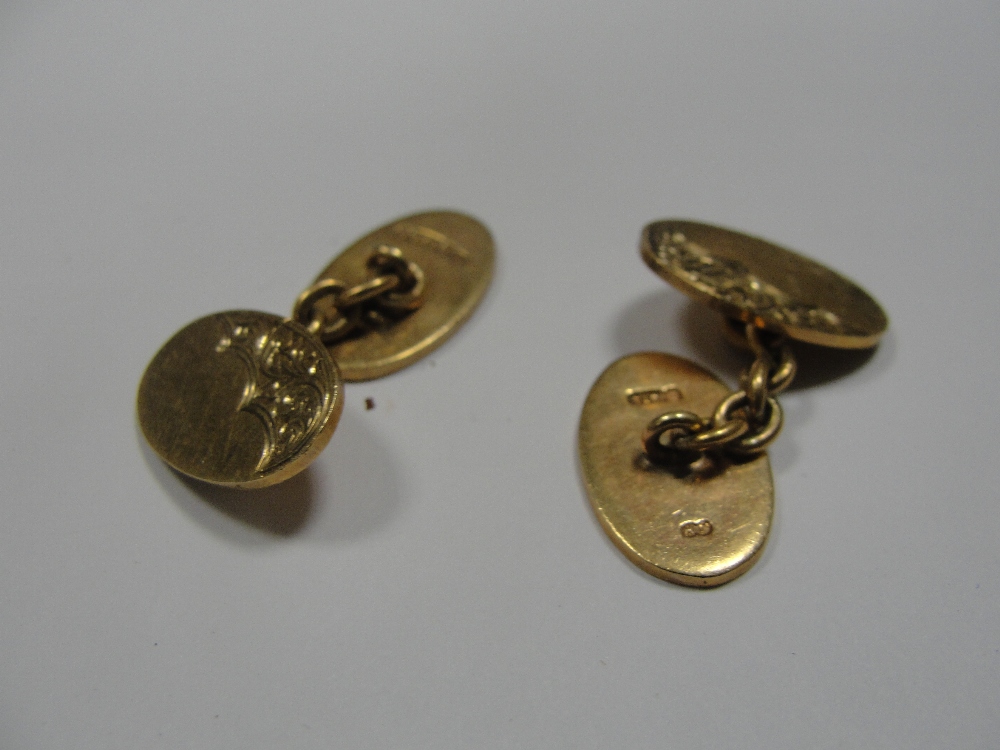 A pair of 9ct oval cufflinks